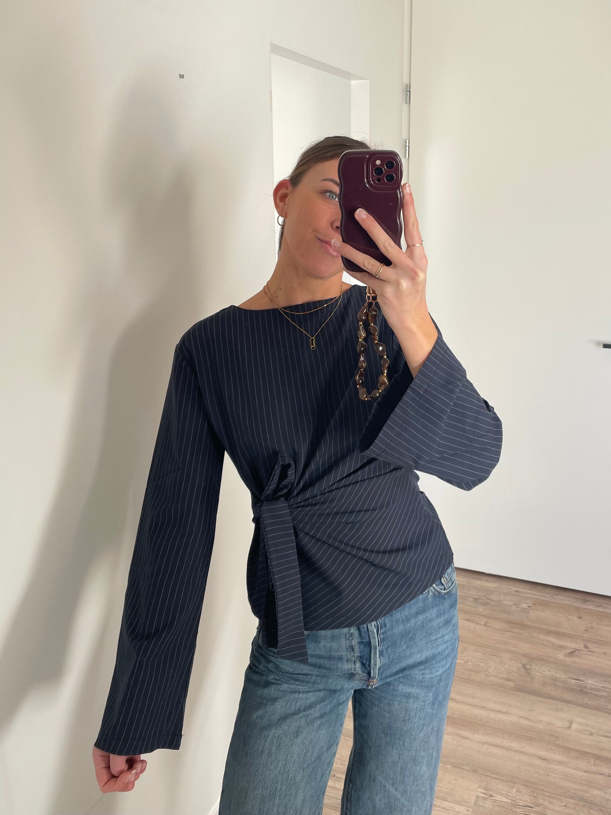 Flared blouse met strik detail in de taille - by LIV Fashion
