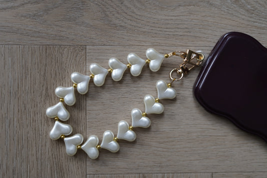 Elegant telefoonkoord met hartjes in parelmoer